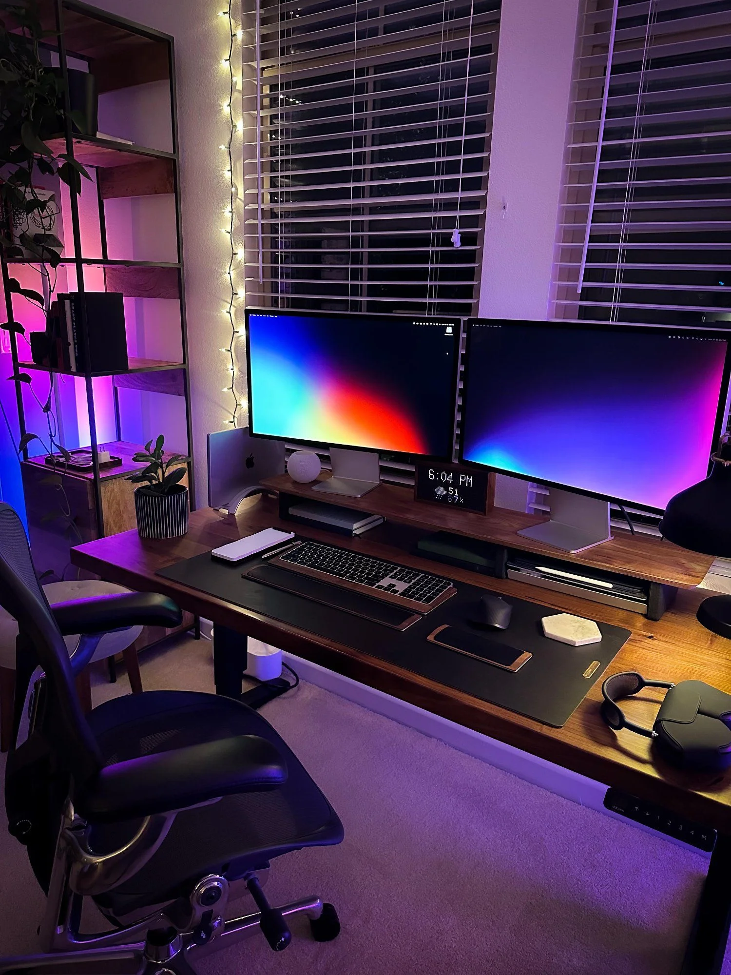 Freelance developer desk workspace with multiple monitors